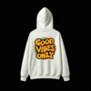 Buzo capucha estampado Good Vibes retro