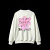 Buzo cuello redondo, estampa flor con frase